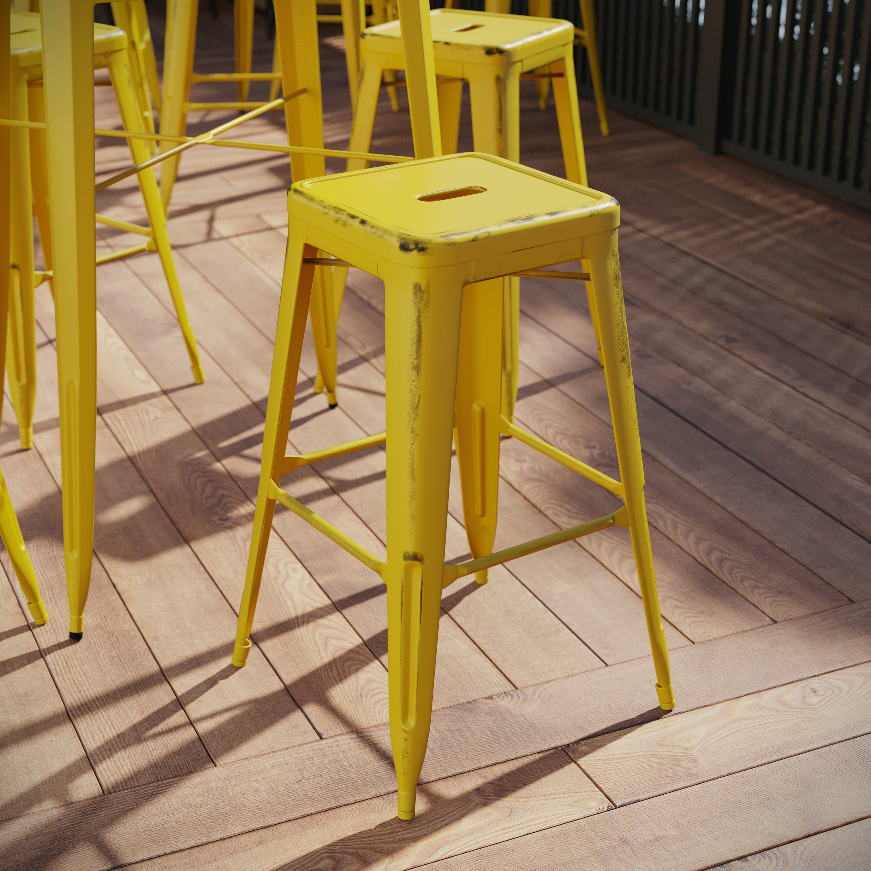 Kai Commercial Grade 30" High Backless Distressed Yellow Metal Indoor-Outdoor Barstool