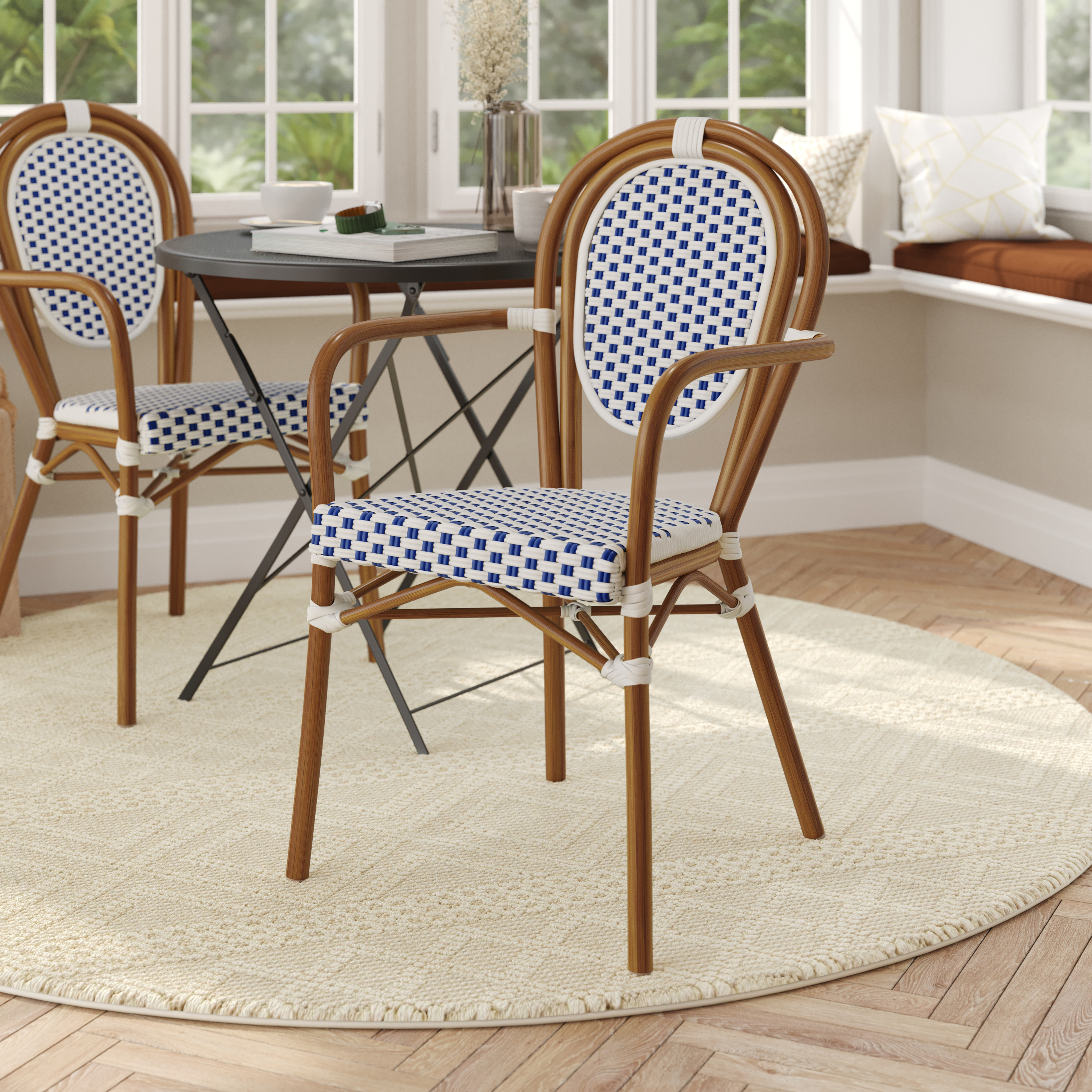 Lourdes Indoor/Outdoor Commercial Thonet French Bistro Stacking Chair with Arms, White and Navy PE Rattan and Bamboo Print Aluminum Frame in Natural